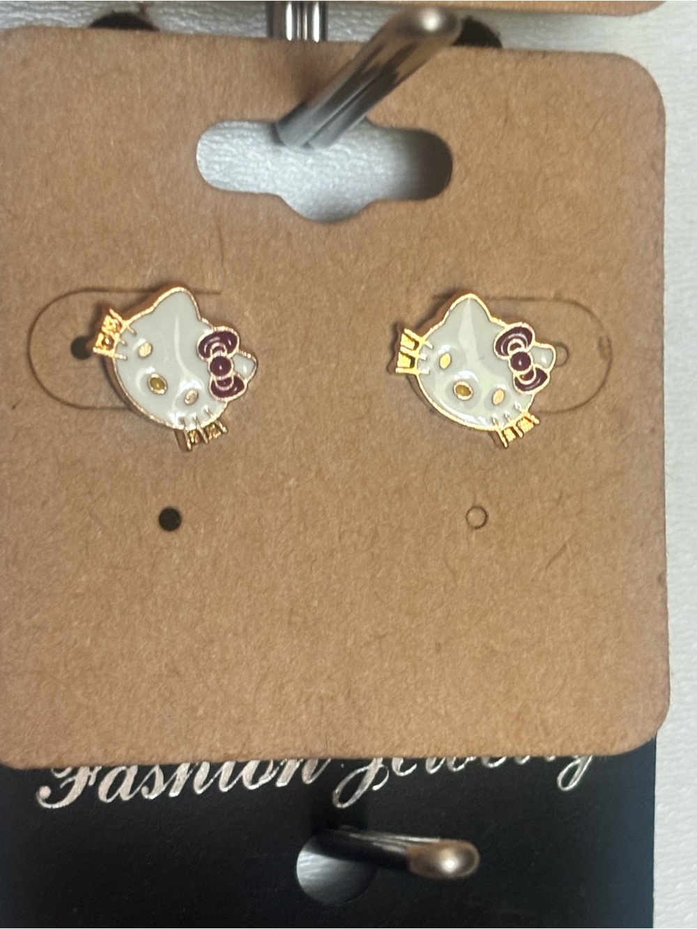Gold-Tone White Cat Face Stud Earrings with Purple Bow